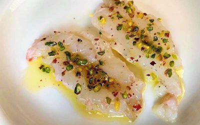 Carpaccio di scampi di Mazara del Vallo con granella di pistacchi siciliani