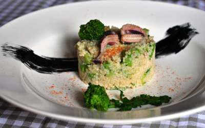 Cous cous integrale con cime di rapa e seppie